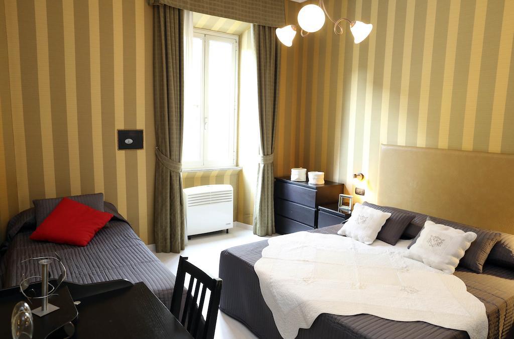 Caracciolo Guest House Рим Номер фото